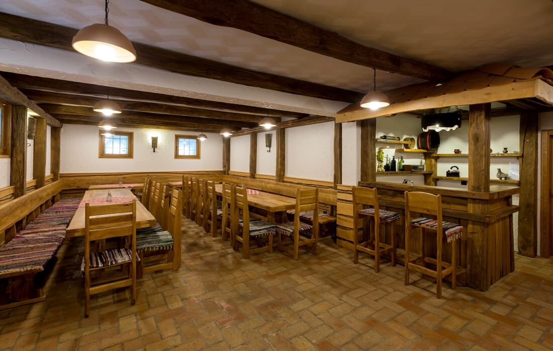 Event room with tables and benches of solid wood